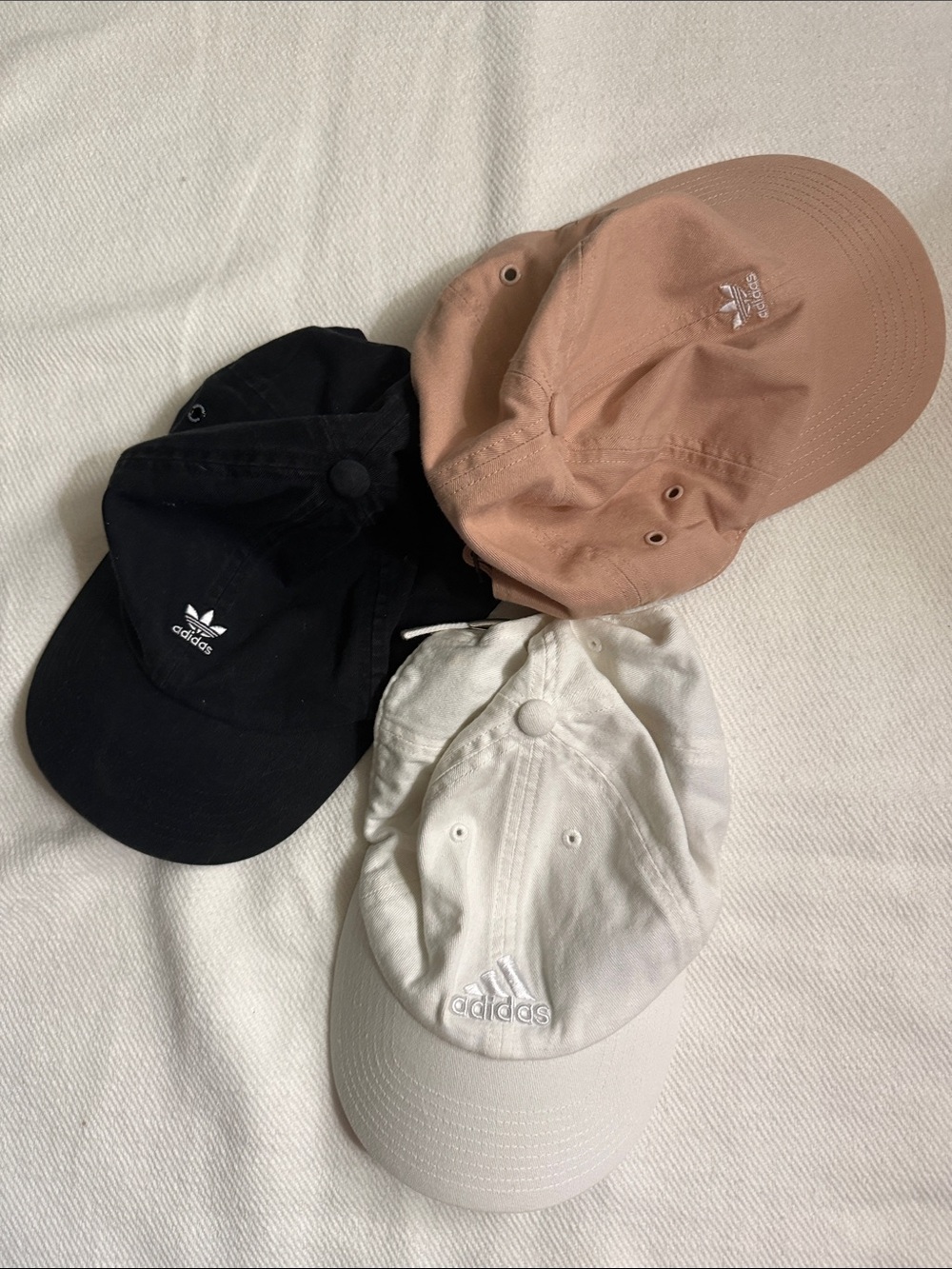 adidas Three-Pack Trefoil Caps in Black, Blush, and White